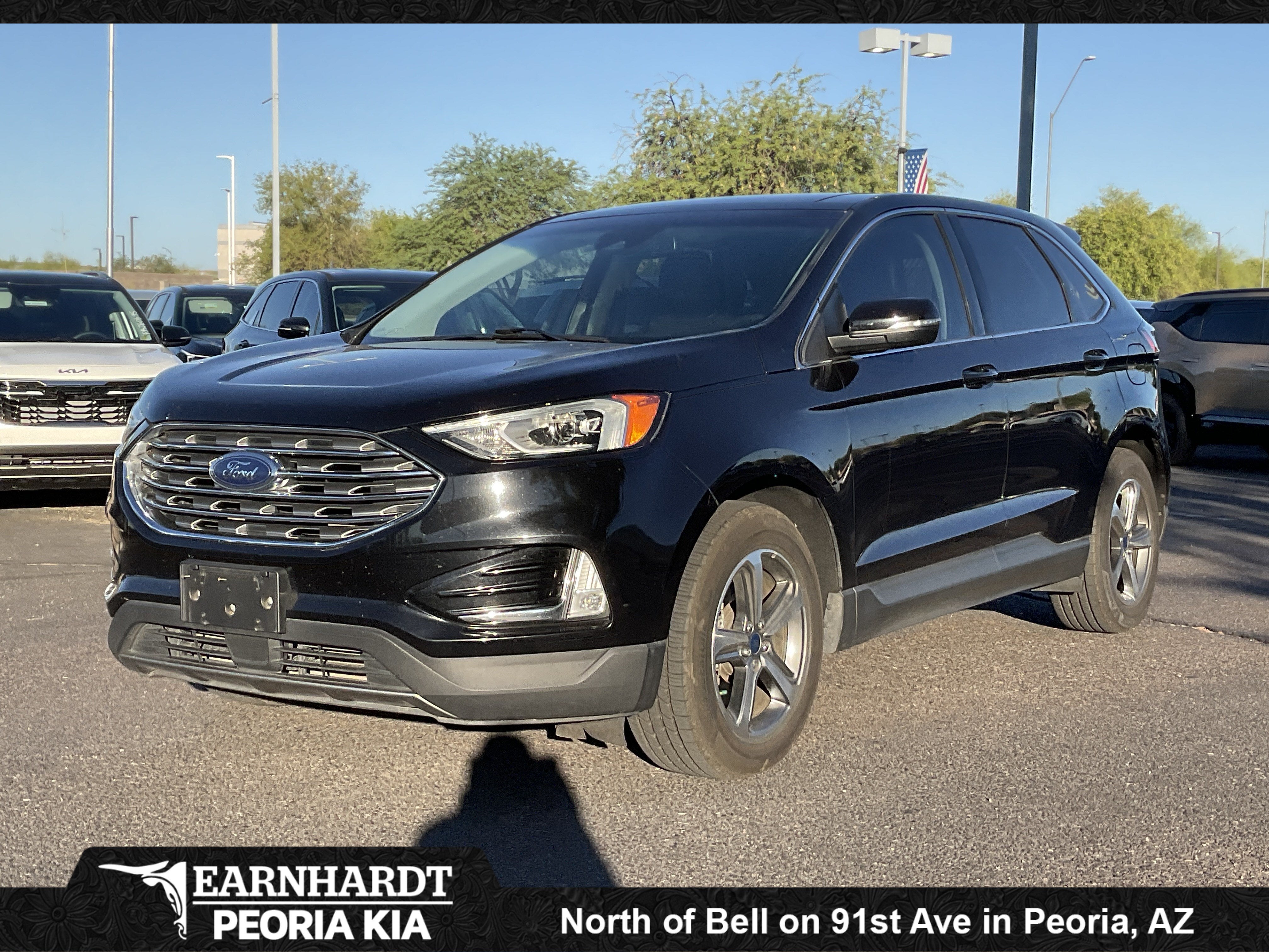 2020 Ford Edge SEL in Agate Black — front three-quarter view