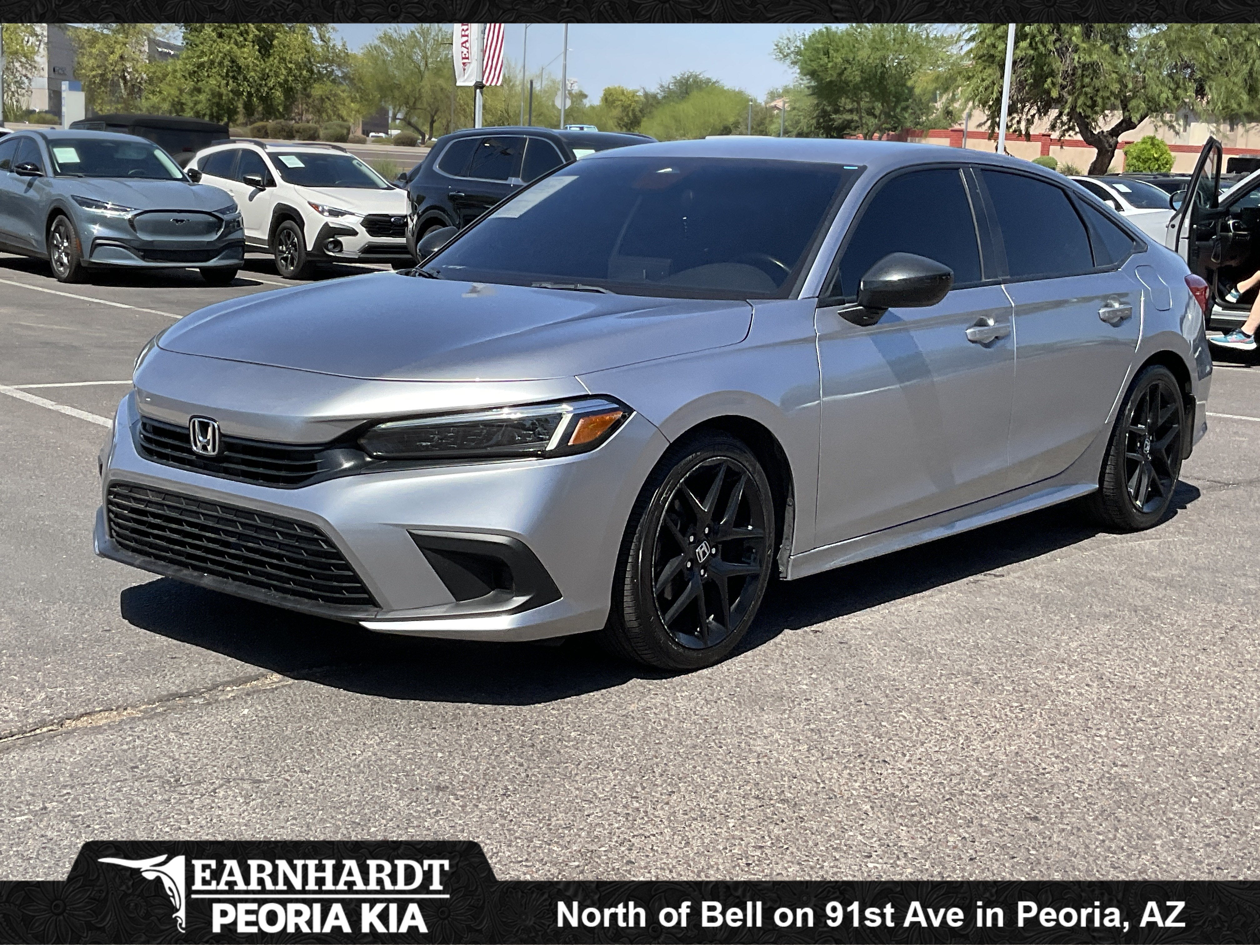 2023 Honda Civic Sedan Sport in Lunar Silver Metallic — front three-quarter view
