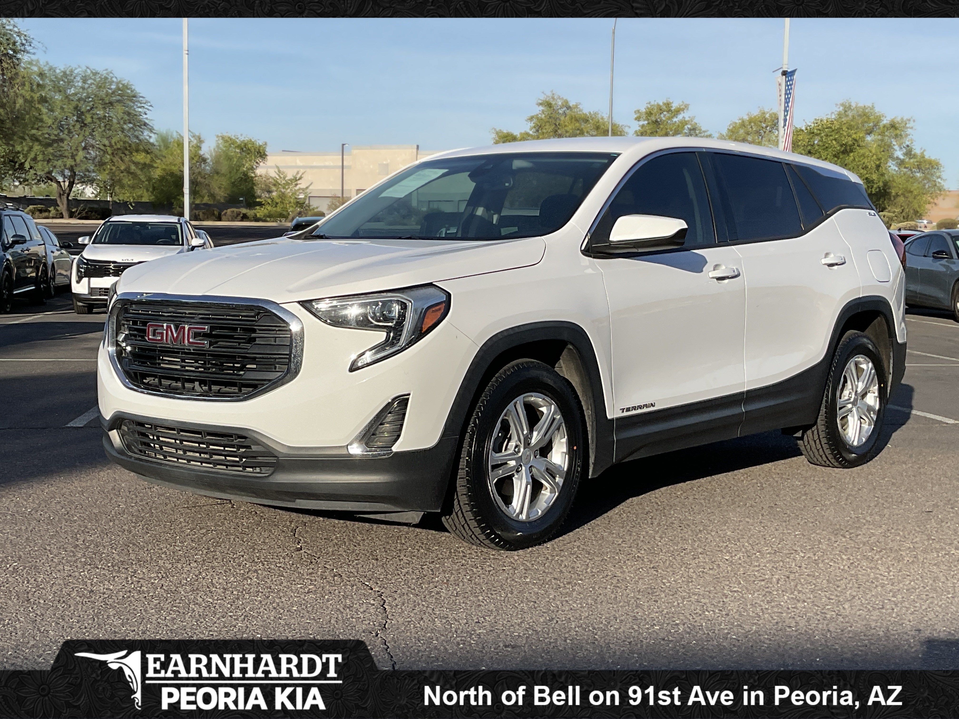 2020 GMC Terrain SLE in Summit White — front three-quarter view
