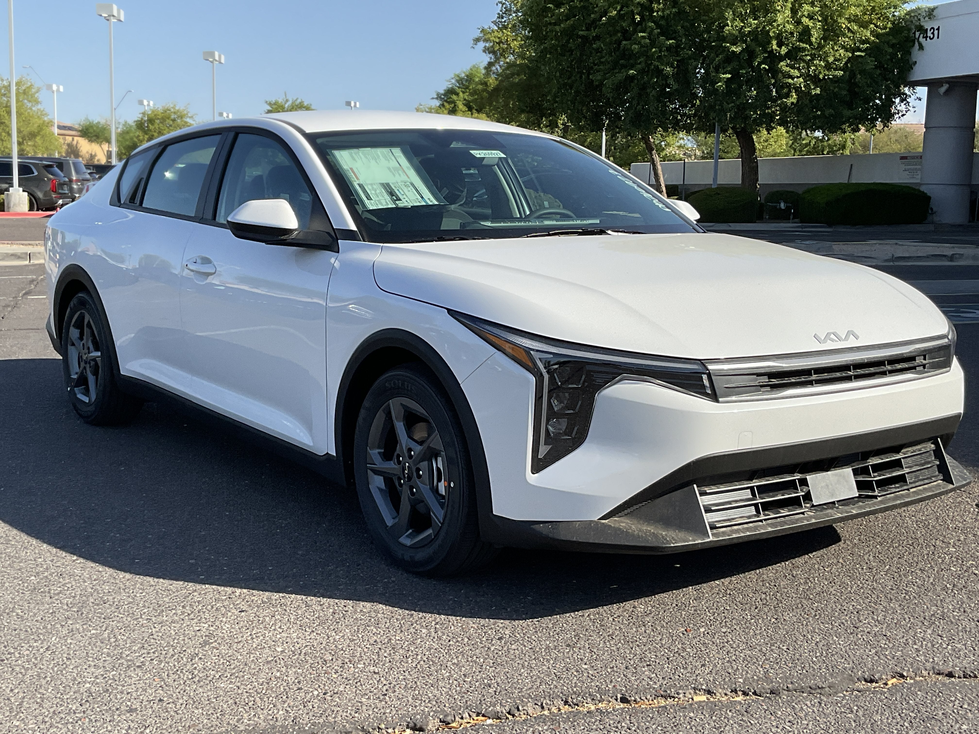 2026 Kia K4 — rear three-quarter view