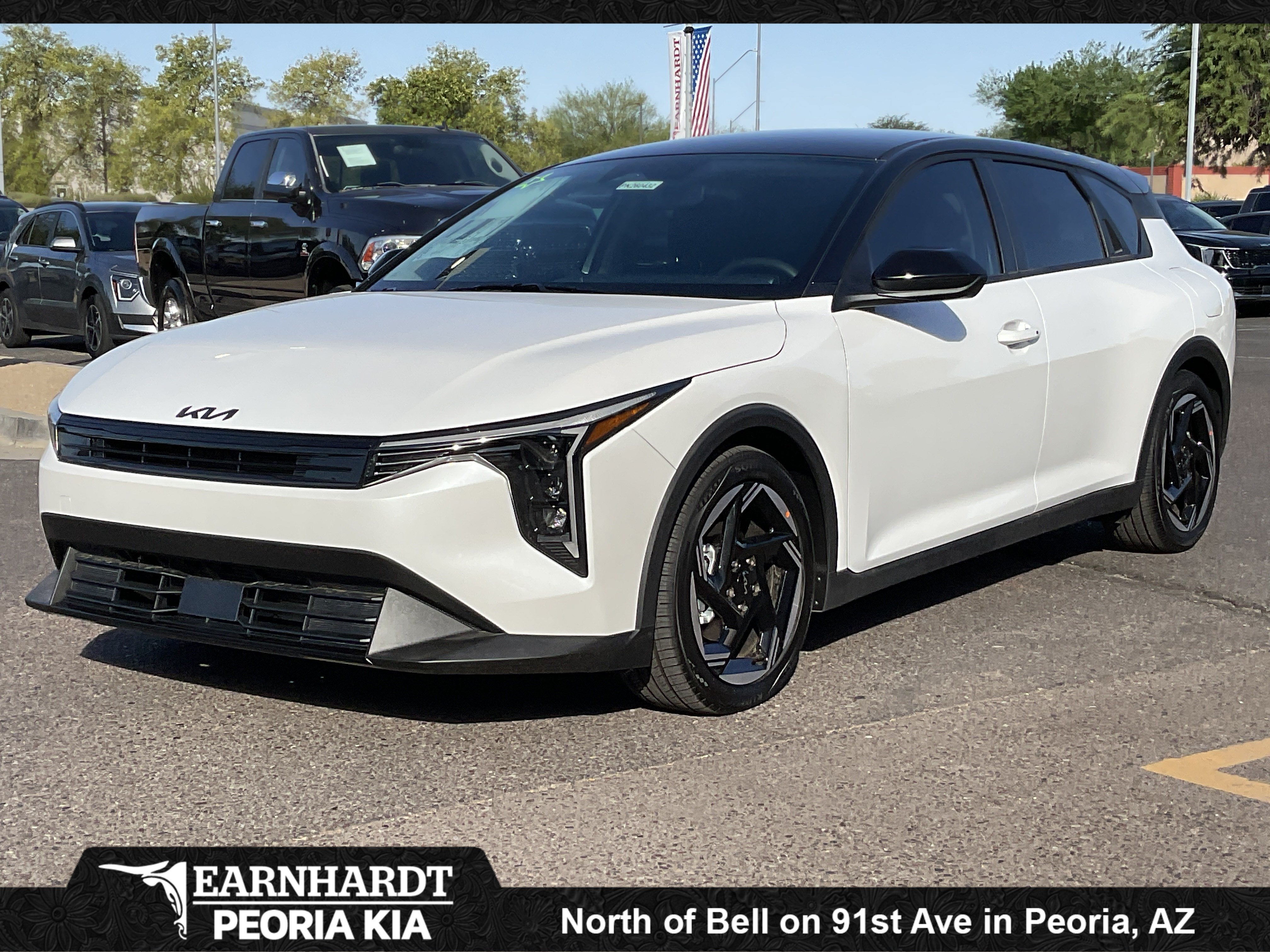 2026 Kia K4 Hatchback EX in Snow White Pearl — front three-quarter view
