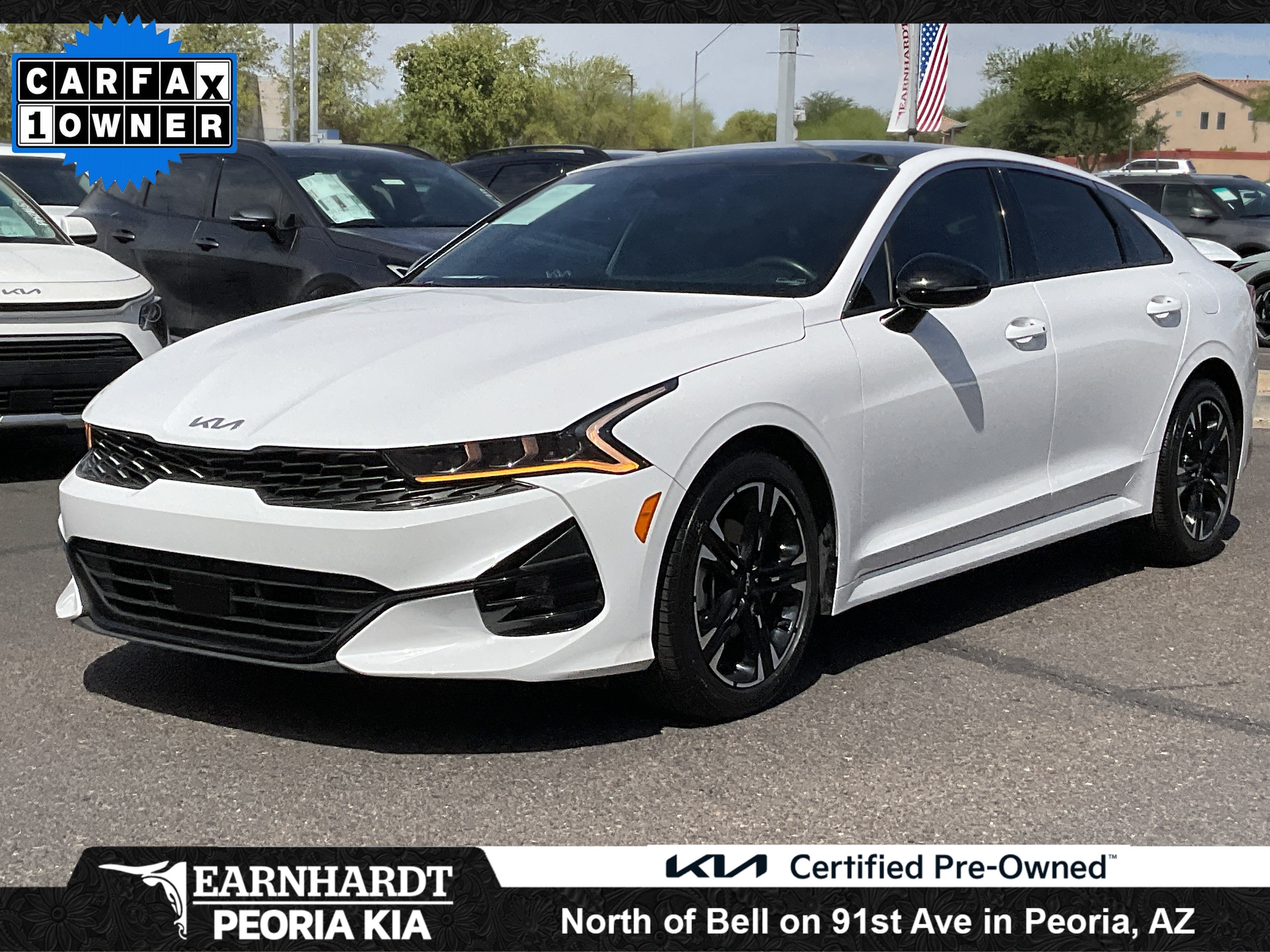2024 Kia K5 GT-Line in Glacial White Pearl — front three-quarter view
