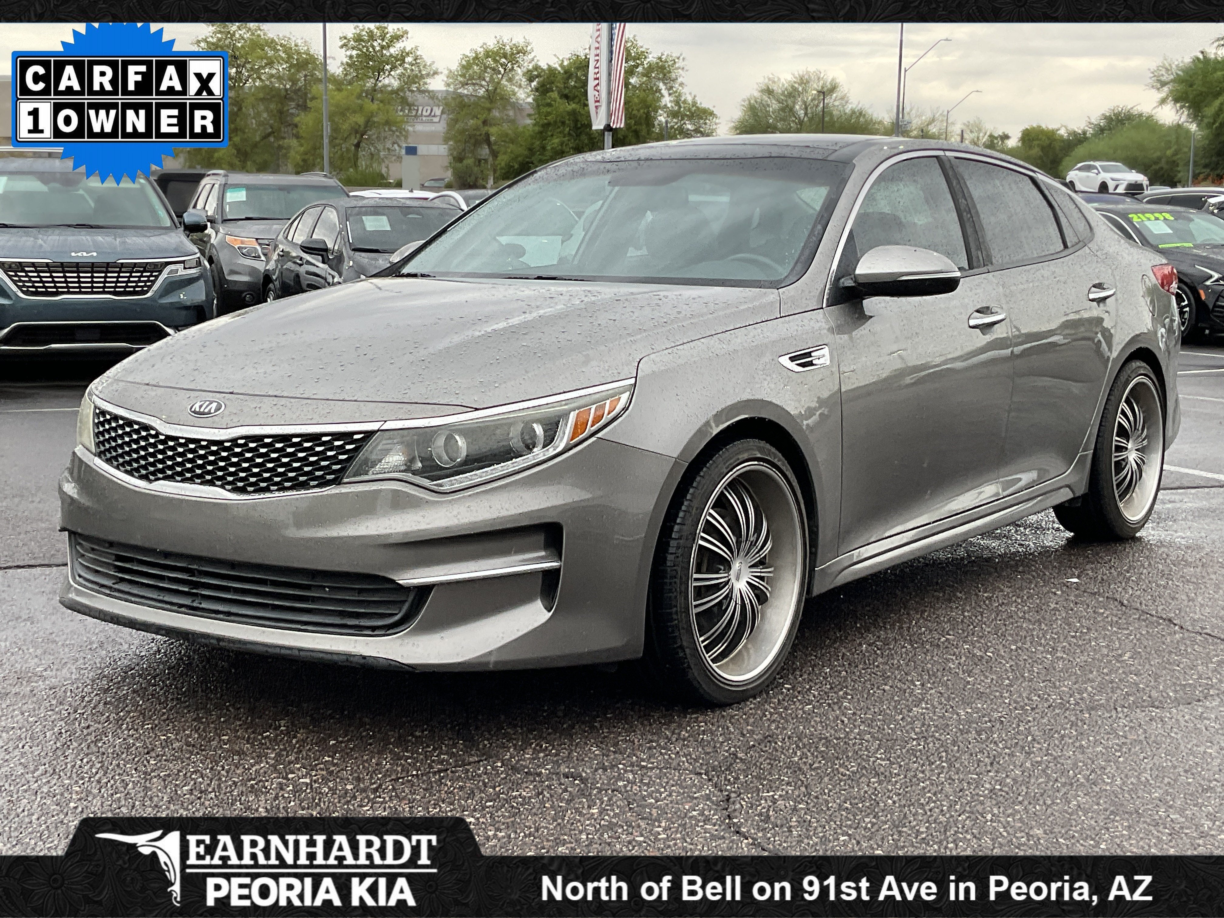 2016 Kia Optima EX in Titanium Gray — front three-quarter view