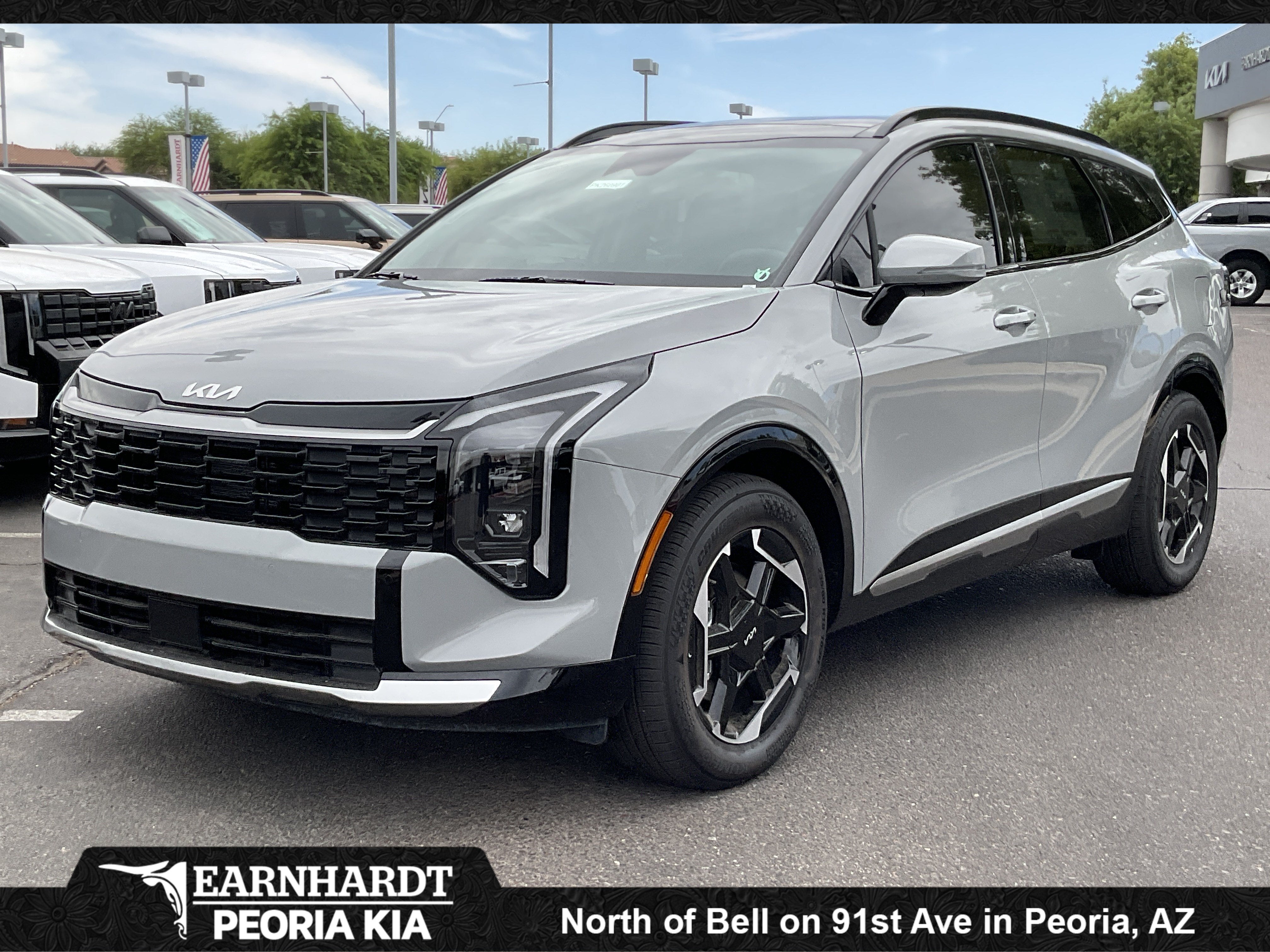 2026 Kia Sportage SX in Wolf Gray — front three-quarter view