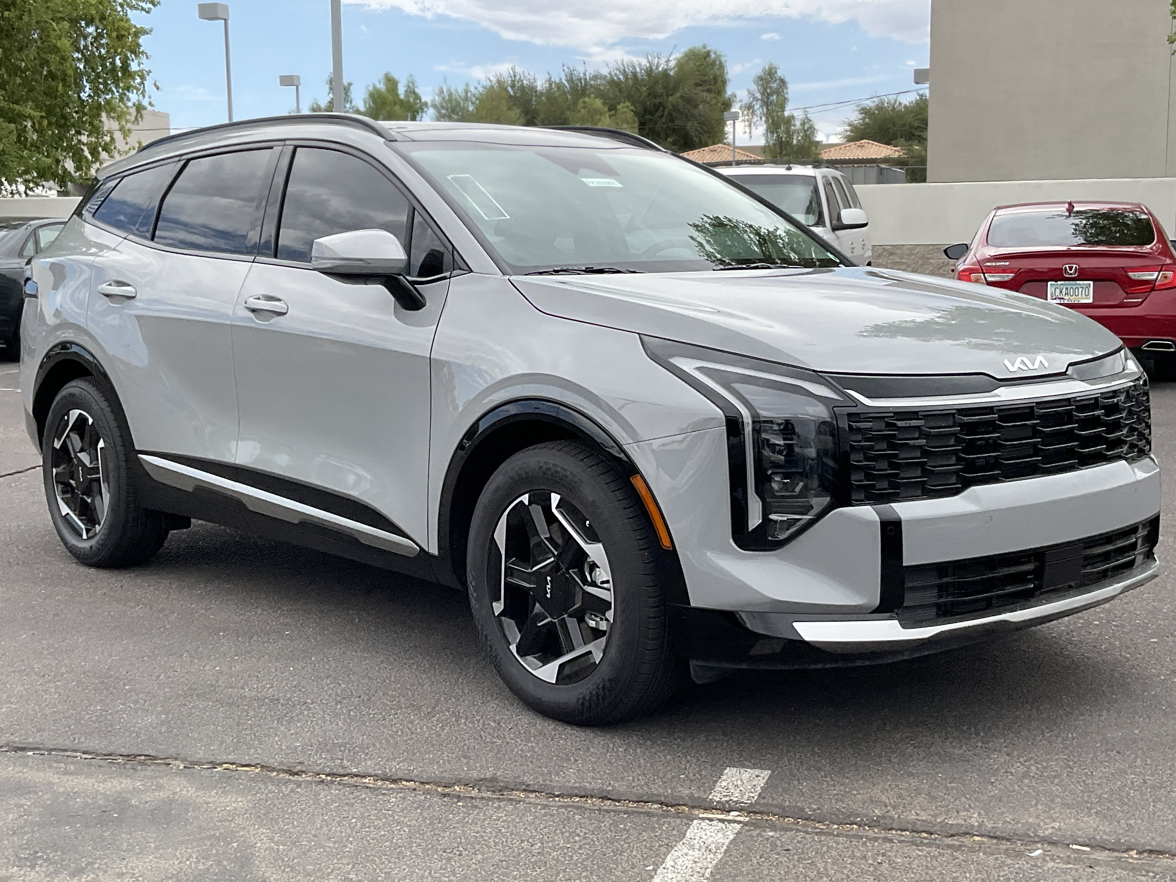 2026 Kia Sportage — rear three-quarter view