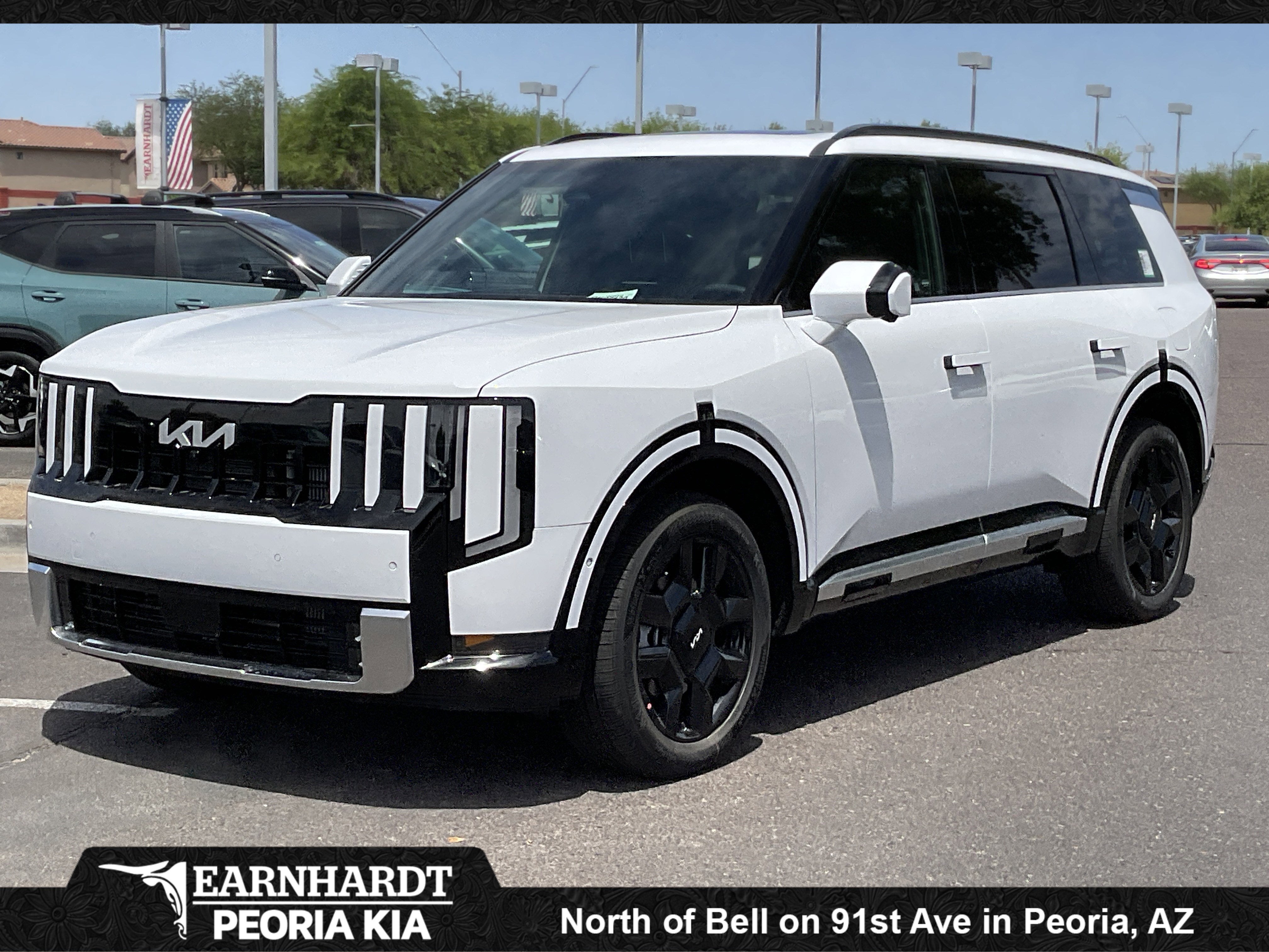 2027 Kia Telluride Hybrid SX in Glacial White Pearl — front three-quarter view