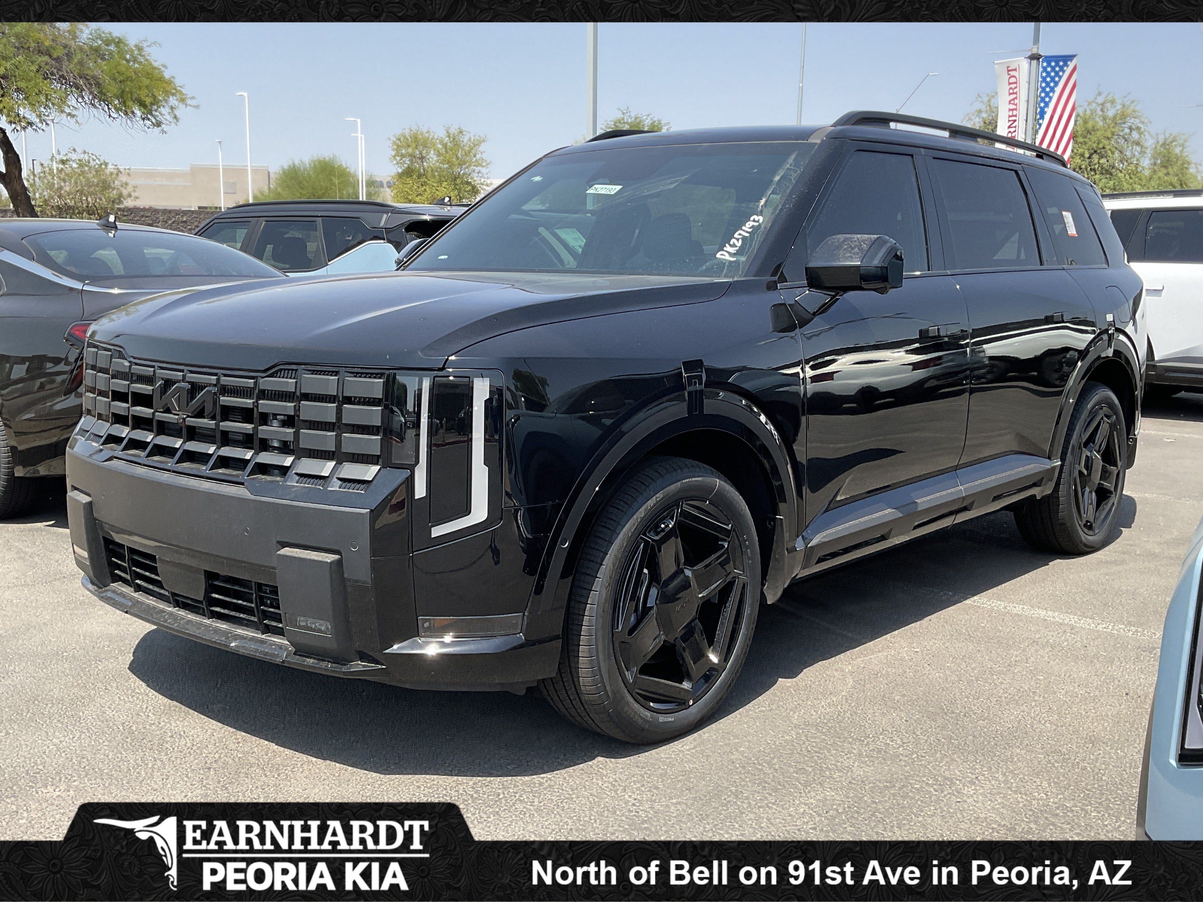 2027 Kia Telluride Hybrid X-Line SX in Ebony Black — front three-quarter view