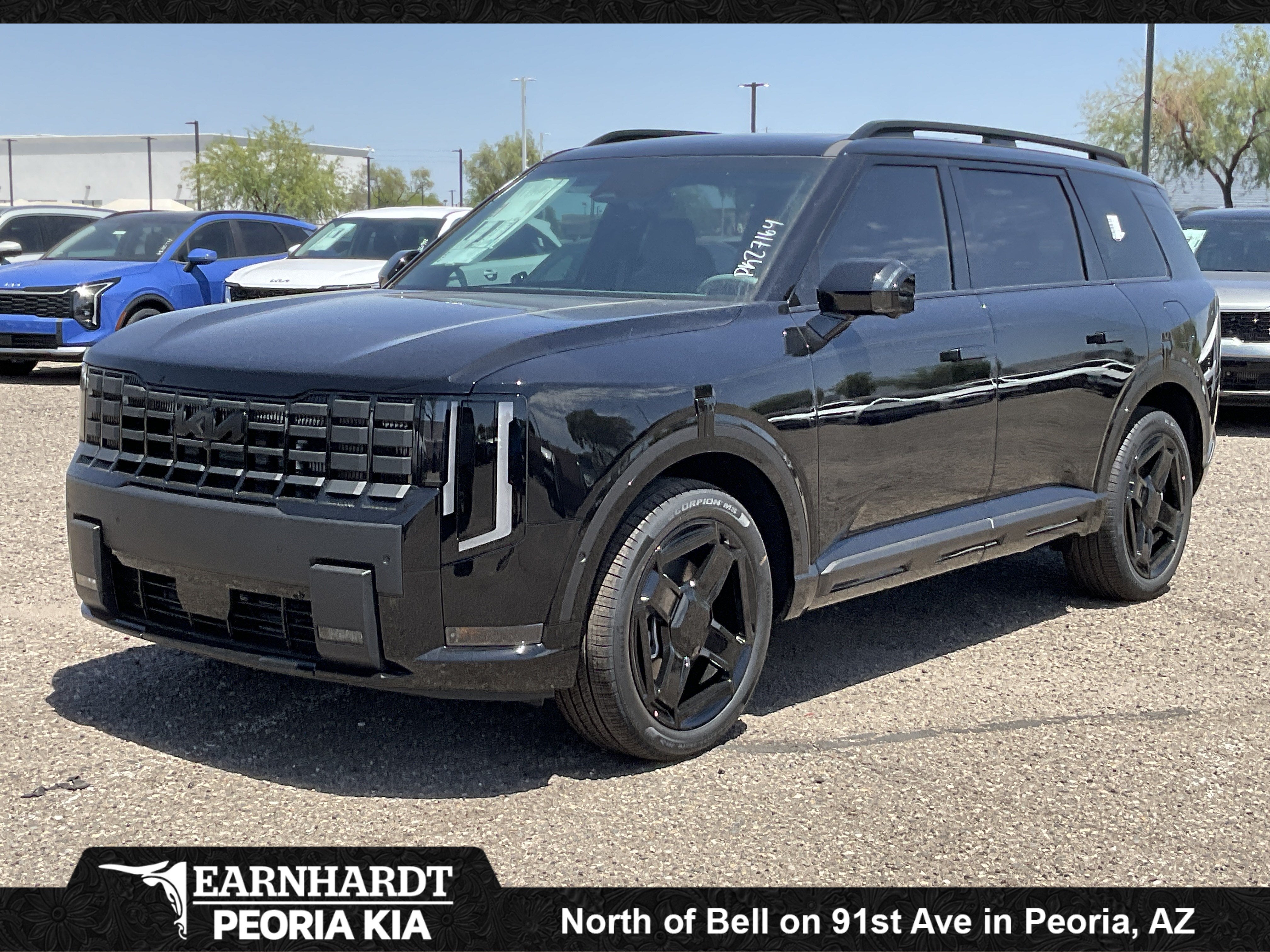 2027 Kia Telluride Hybrid X-Line SX in Ebony Black — front three-quarter view