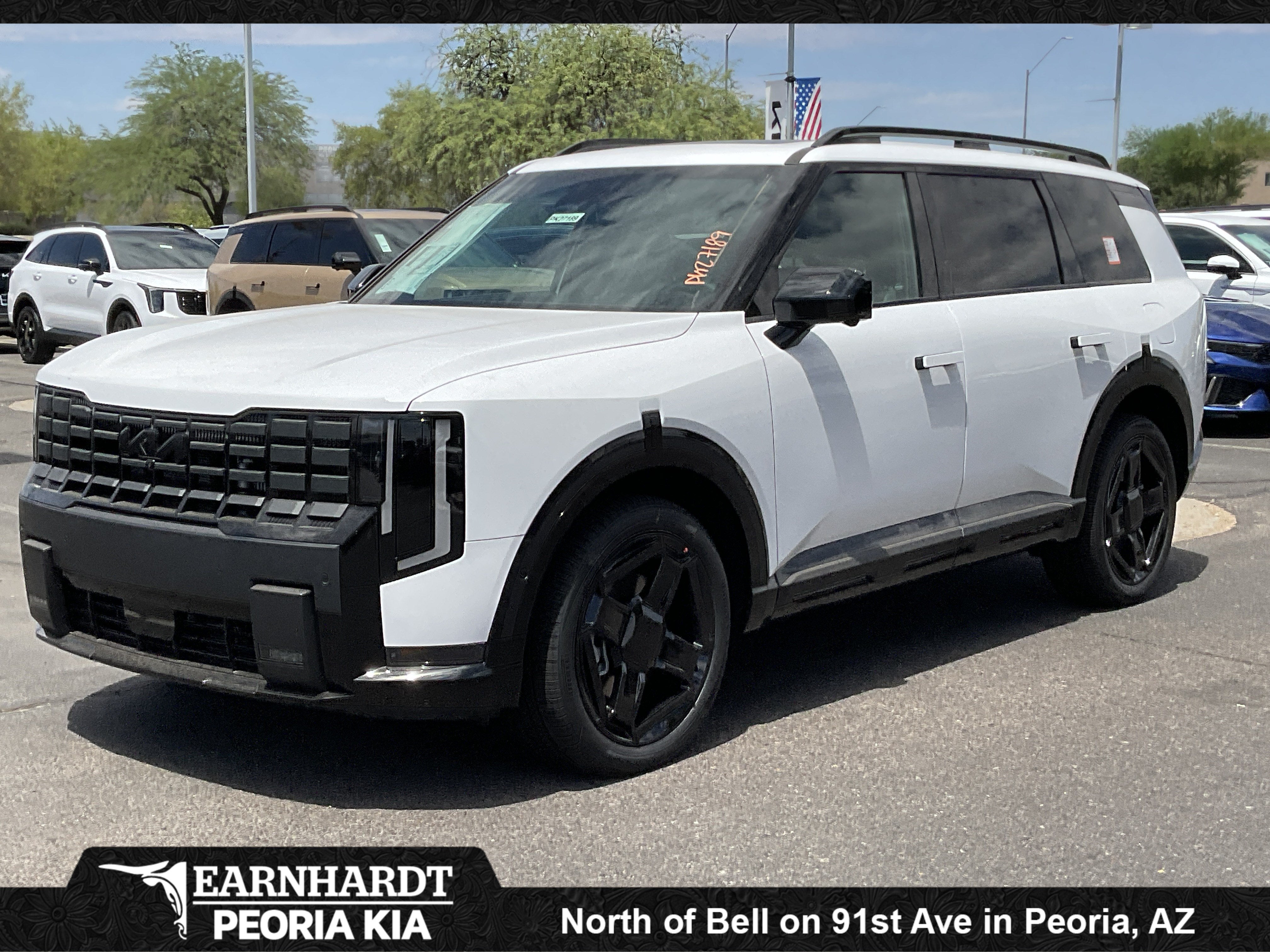 2027 Kia Telluride Hybrid X-Line SX in Glacial White Pearl — front three-quarter view