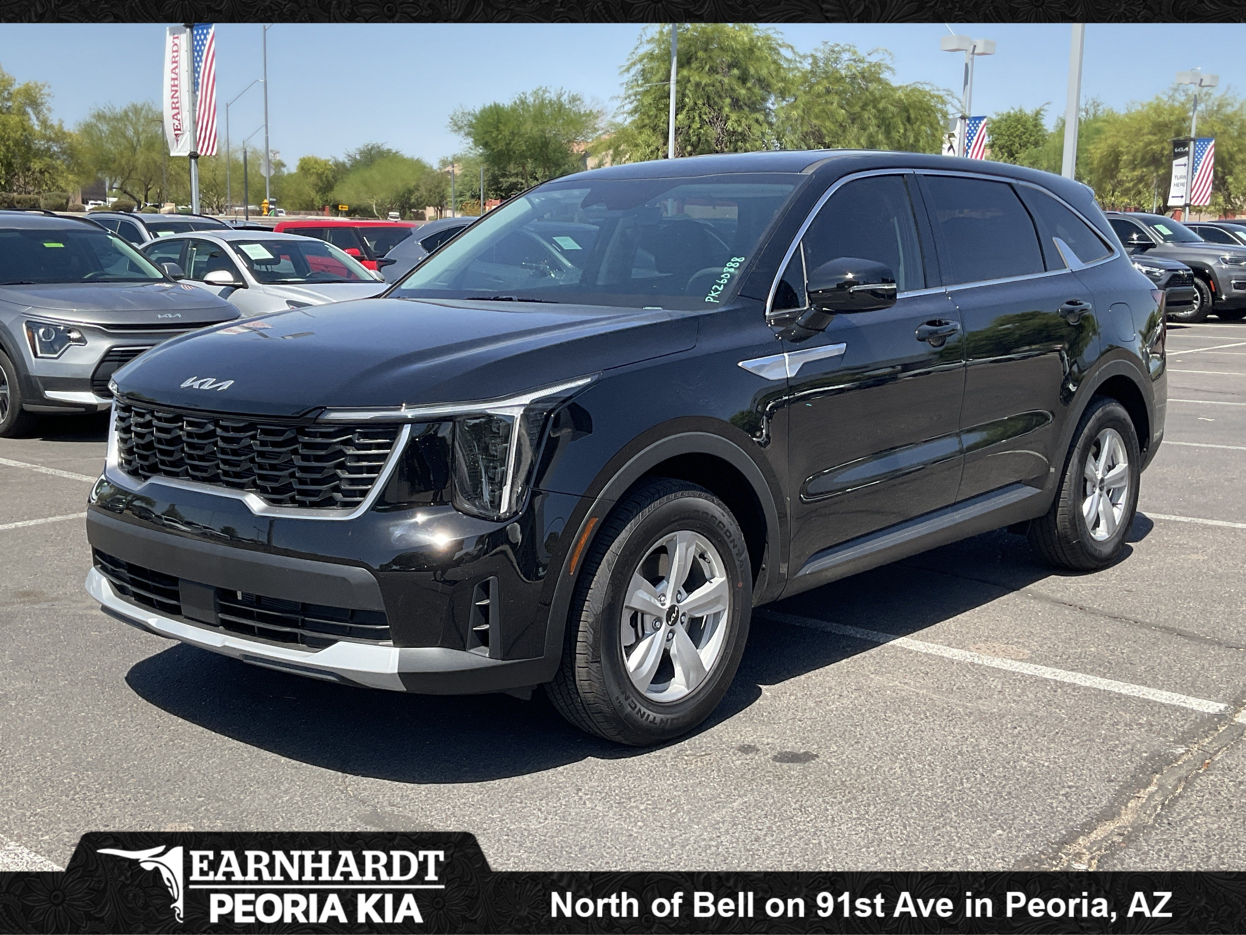 2026 Kia Sorento LX in Ebony Black — front three-quarter view