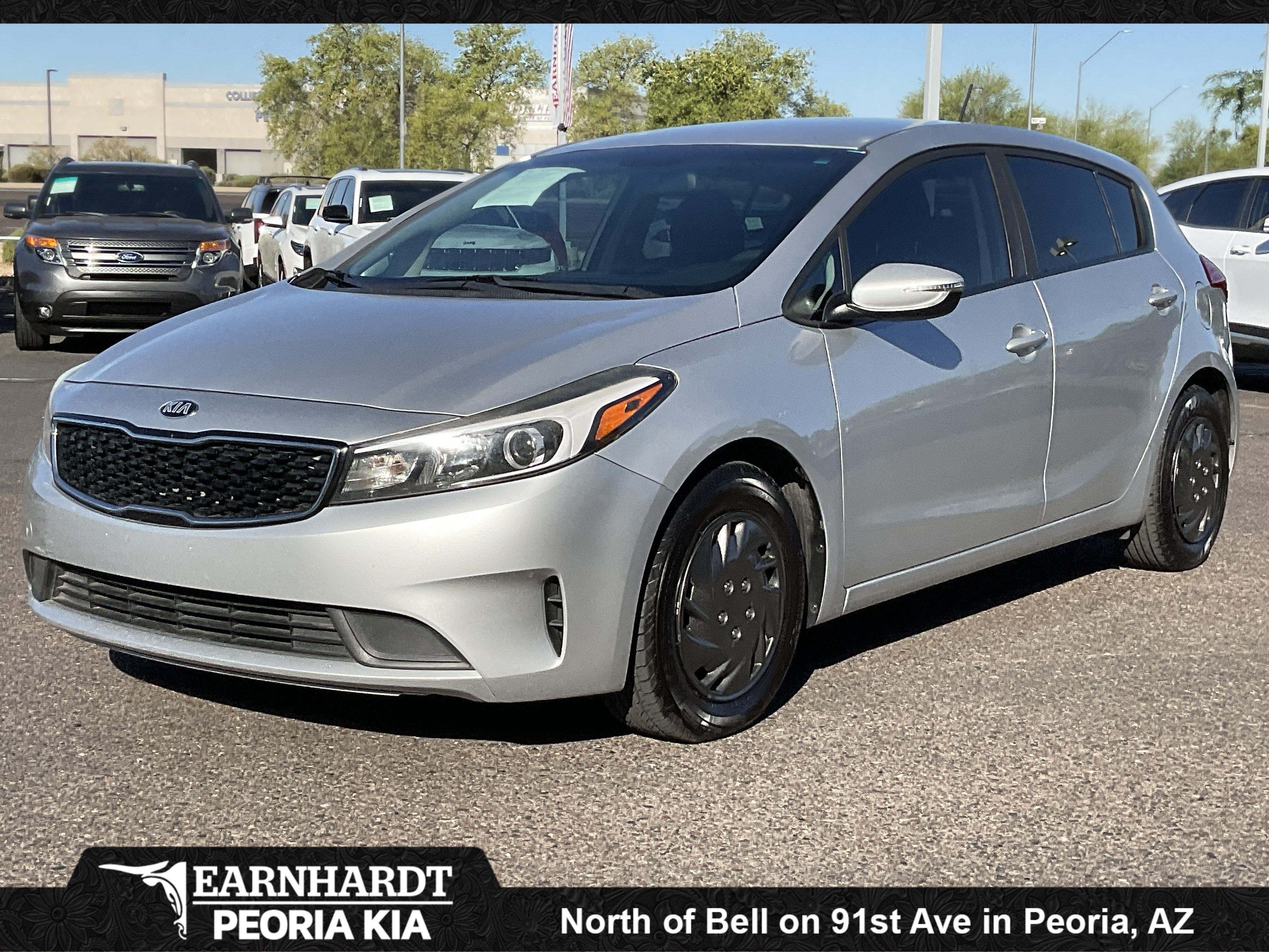 2018 Kia Forte5 LX in Silky Silver — front three-quarter view