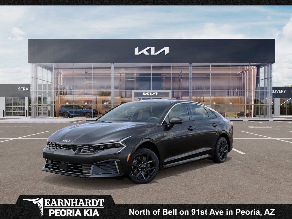 2026 Kia K5 LXS in Interstellar Gray — front three-quarter view