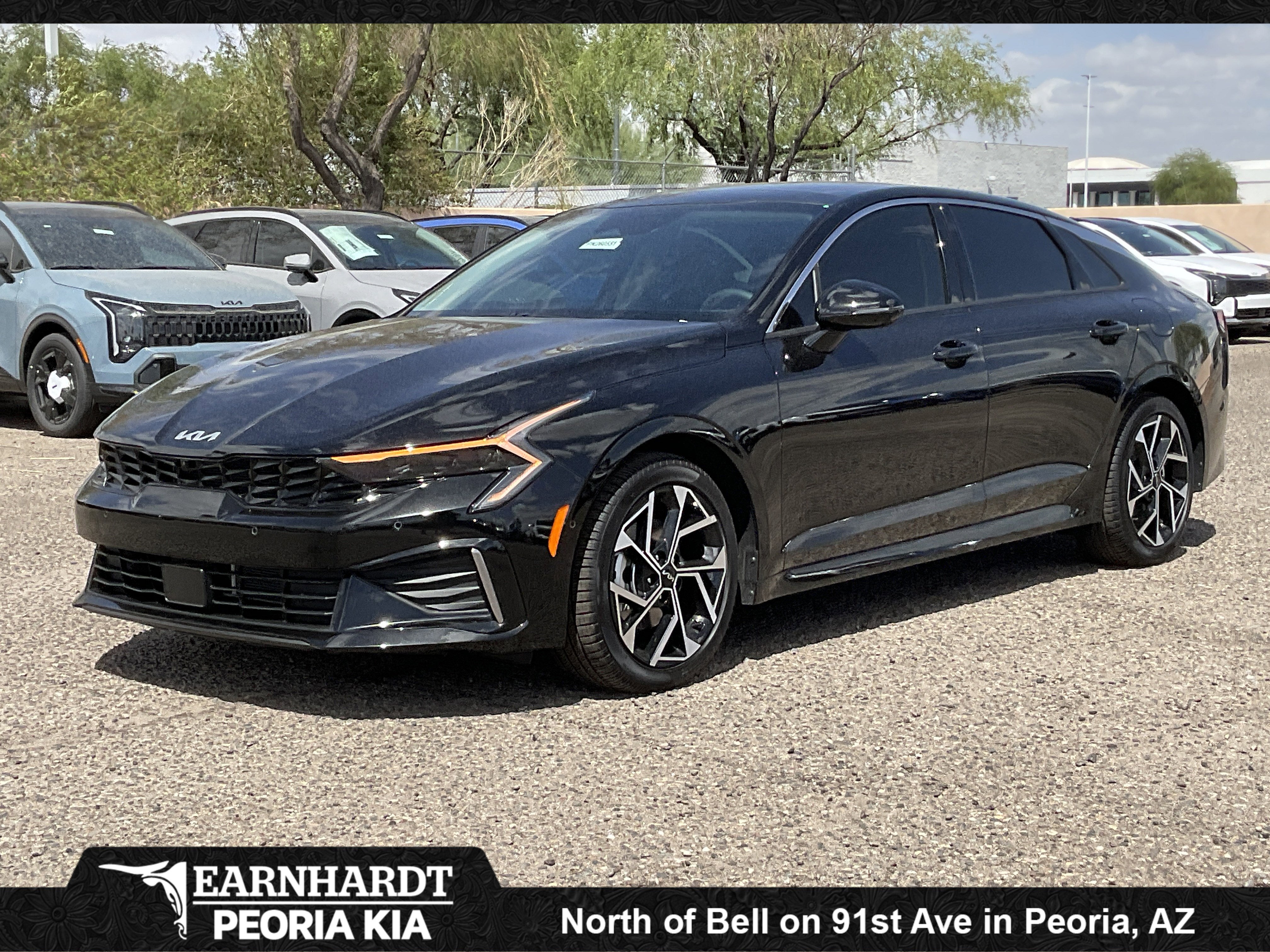 2026 Kia K5 EX in Aurora Black — front three-quarter view