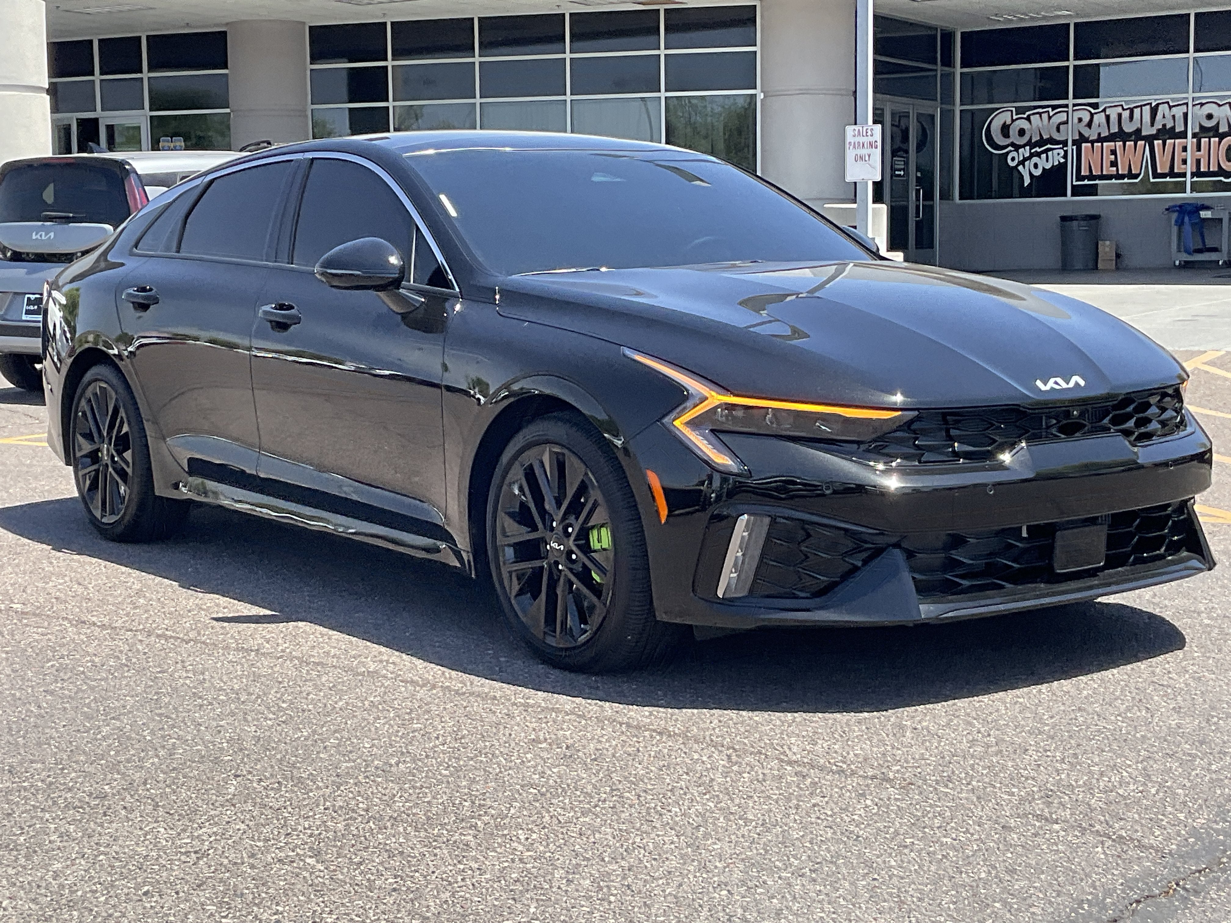 2026 Kia K5 — rear three-quarter view