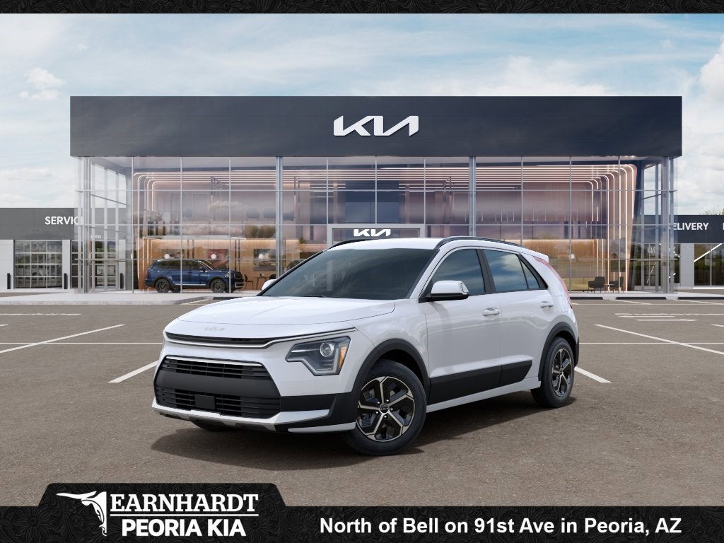 2026 Kia Niro EX in Snow White Pearl — front three-quarter view