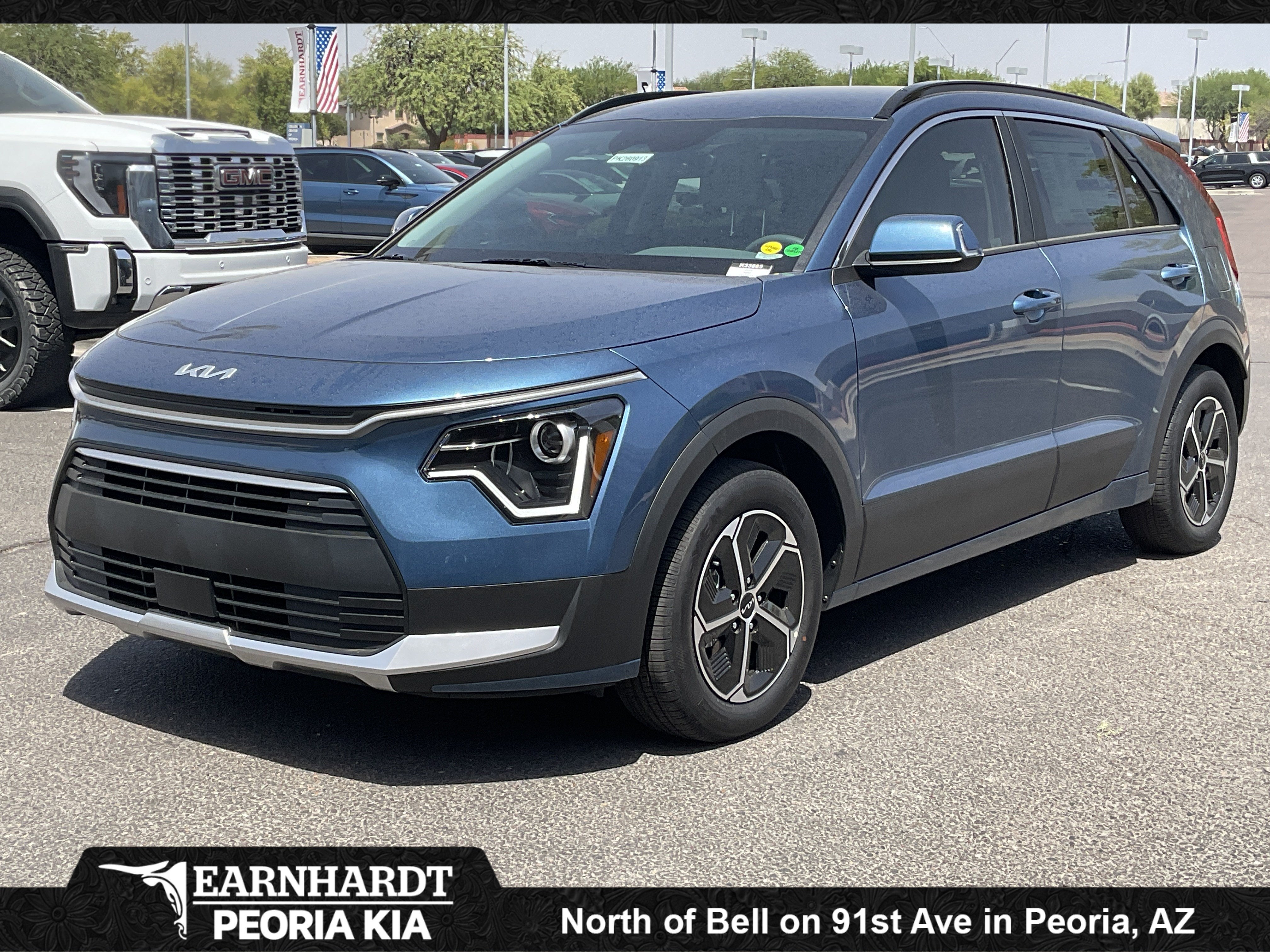 2026 Kia Niro EX in Mineral Silver — front three-quarter view