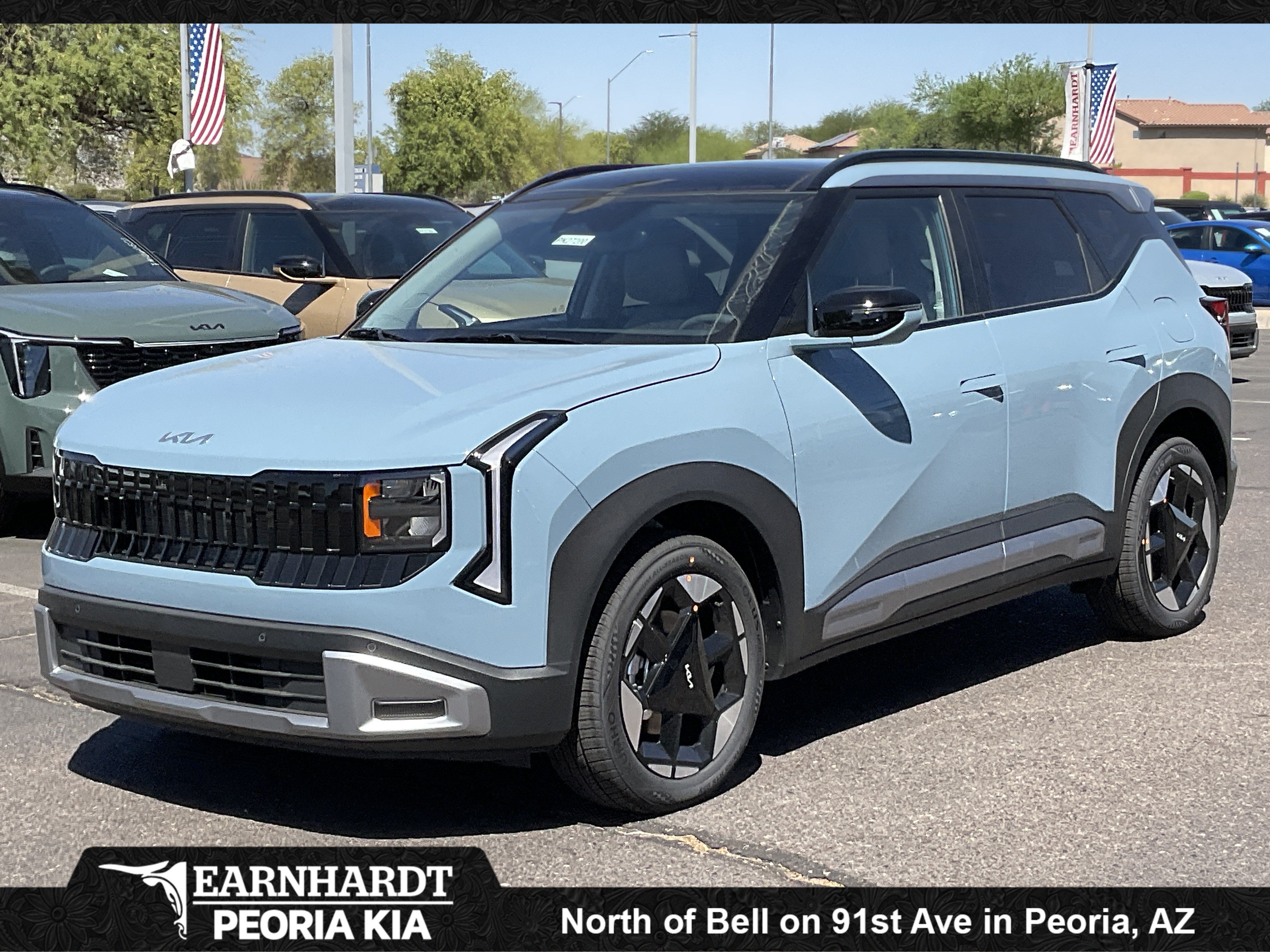 2027 Kia Seltos EX in Frost Blue — front three-quarter view
