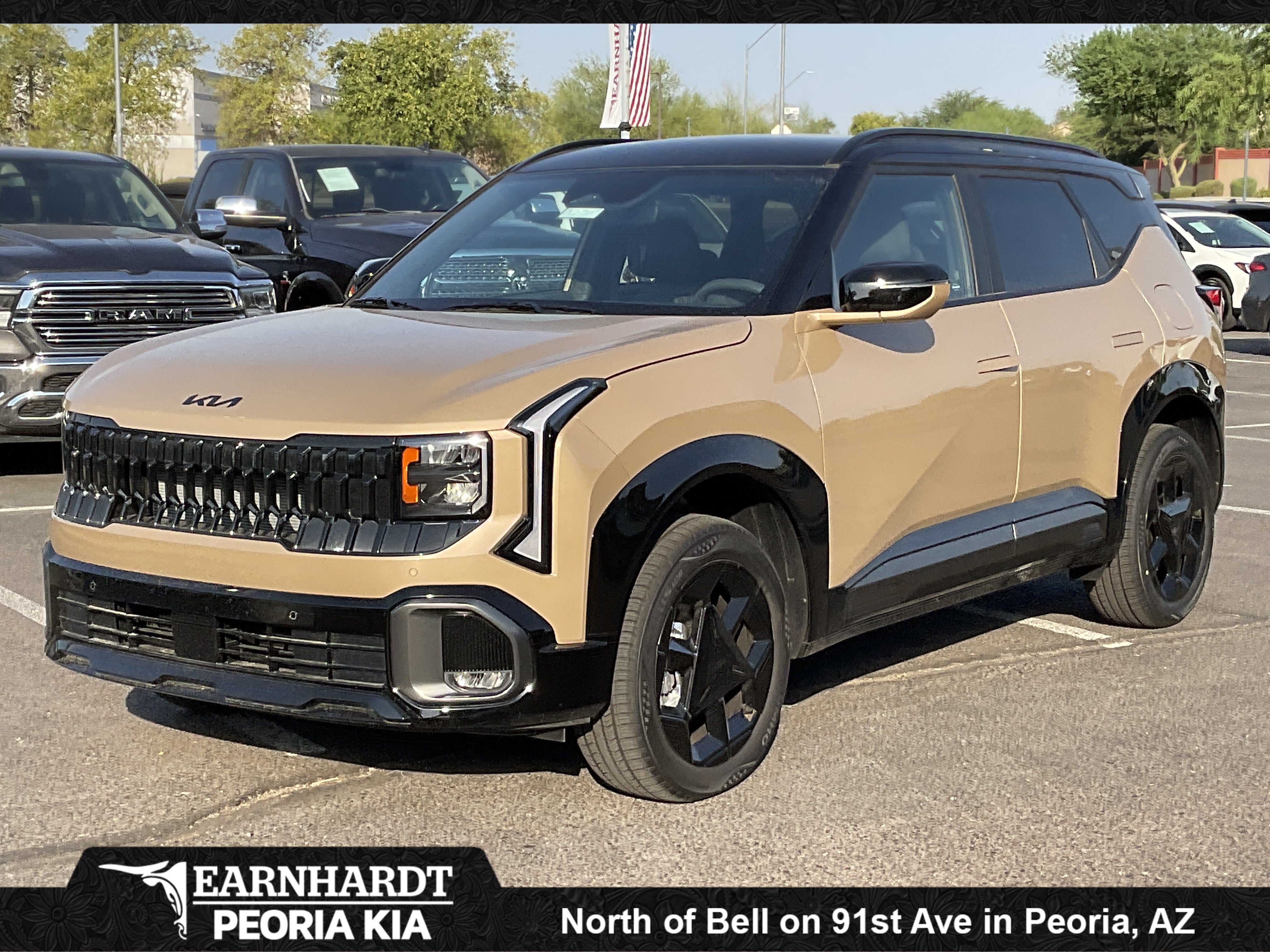 2027 Kia Seltos X-Line S in Terrain Brown — front three-quarter view