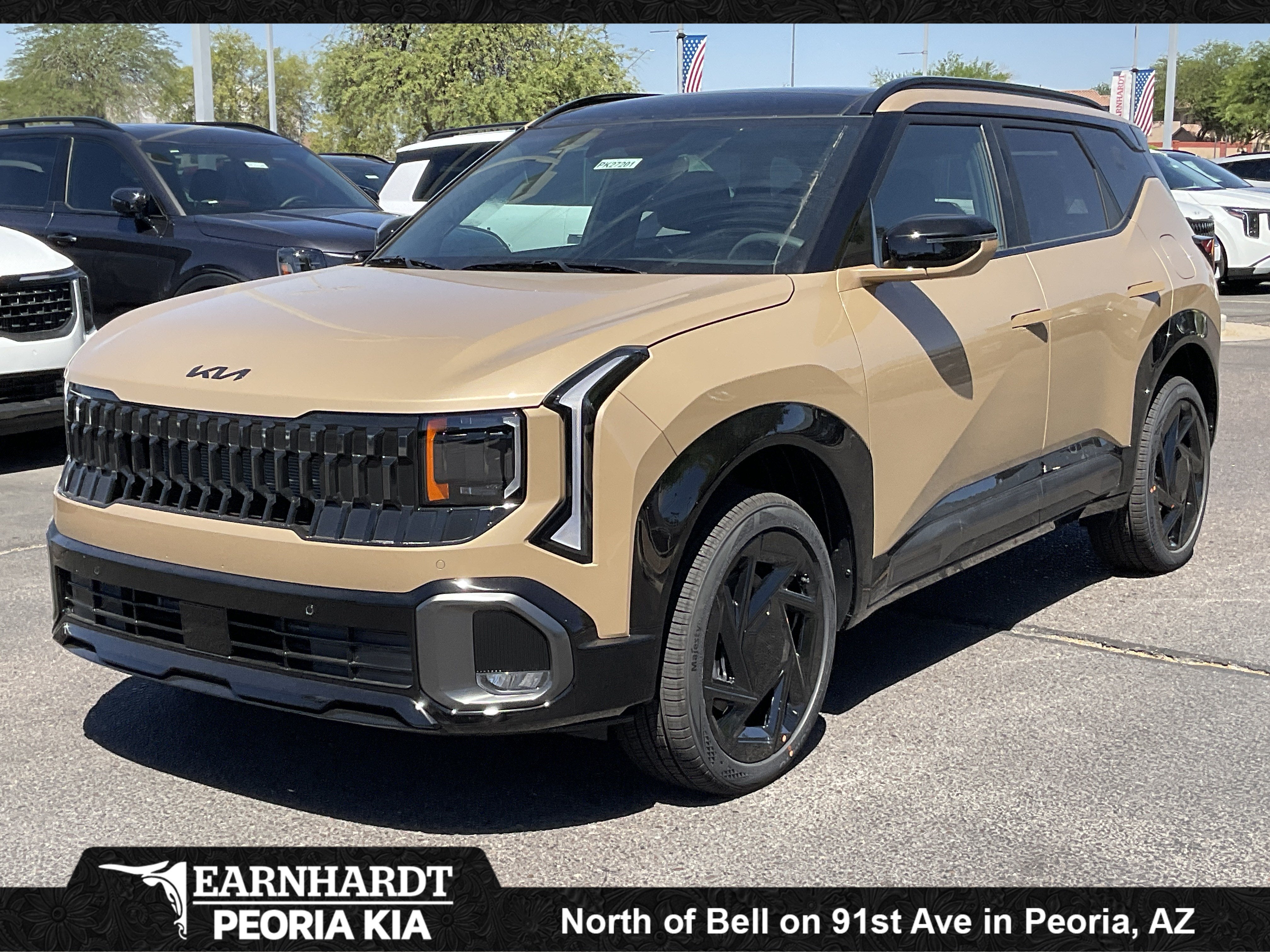 2027 Kia Seltos X-Line SX in Terrain Brown — front three-quarter view