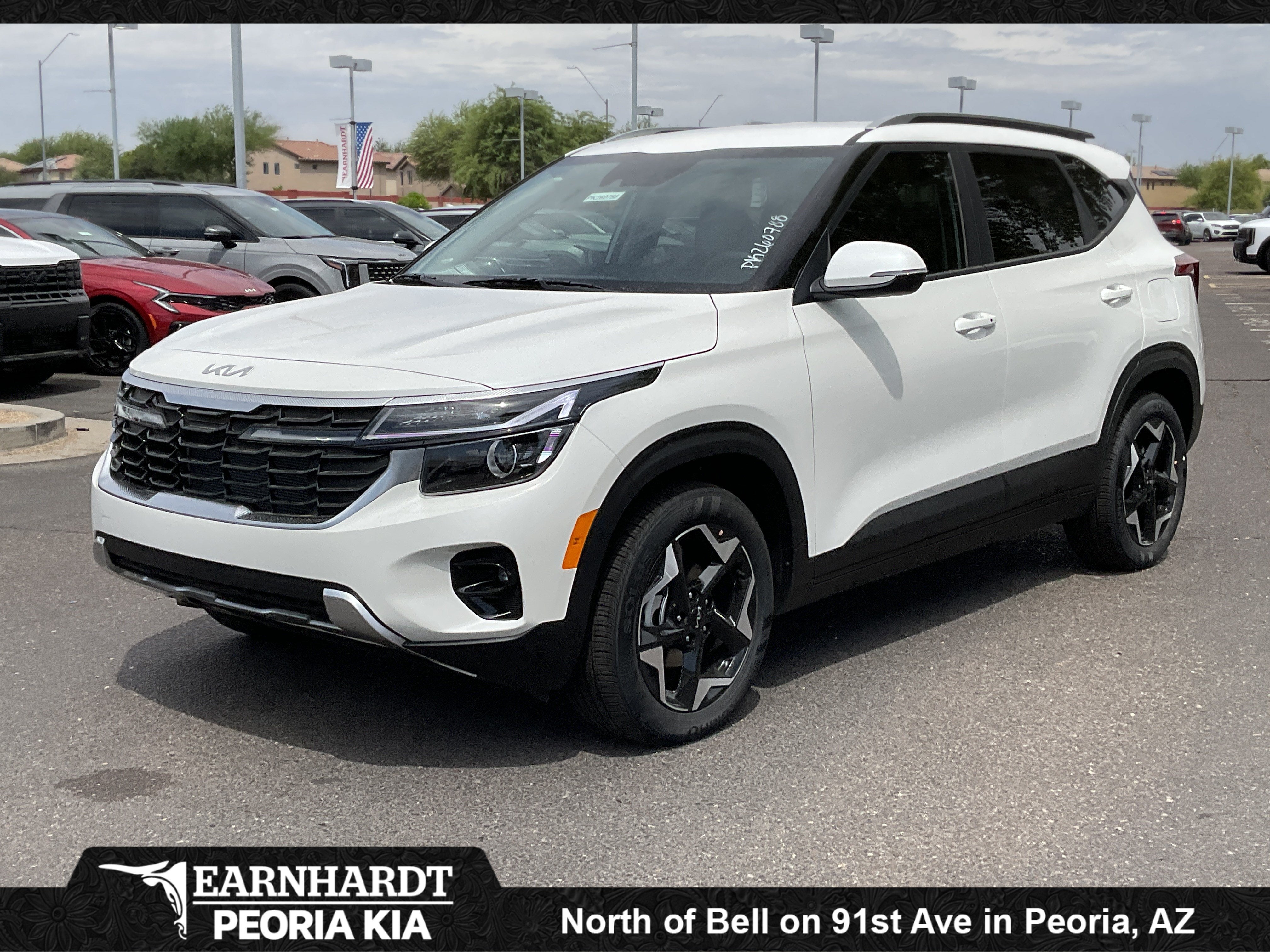 2026 Kia Seltos S in Snow White Pearl — front three-quarter view