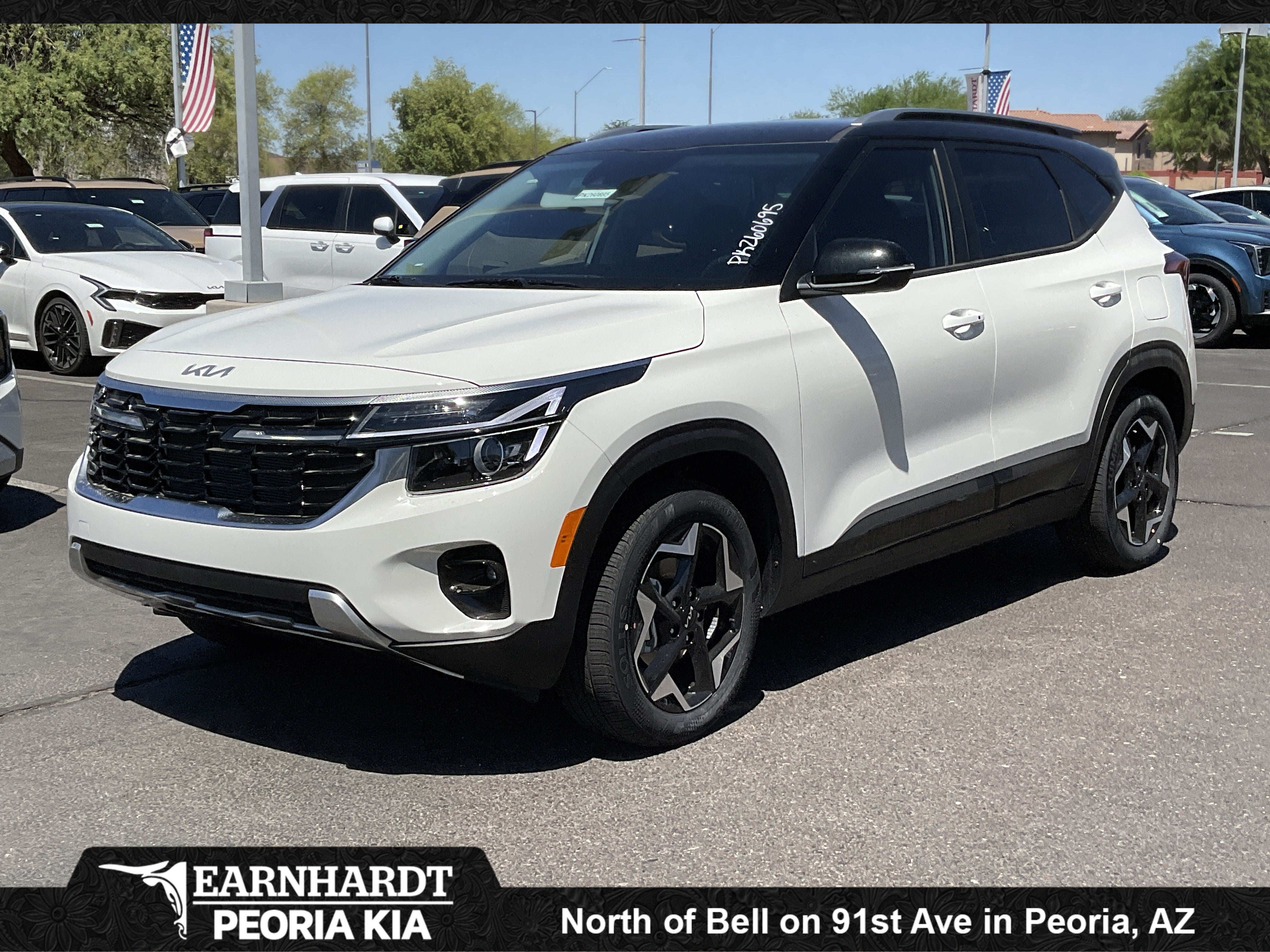 2026 Kia Seltos S in Clear White — front three-quarter view