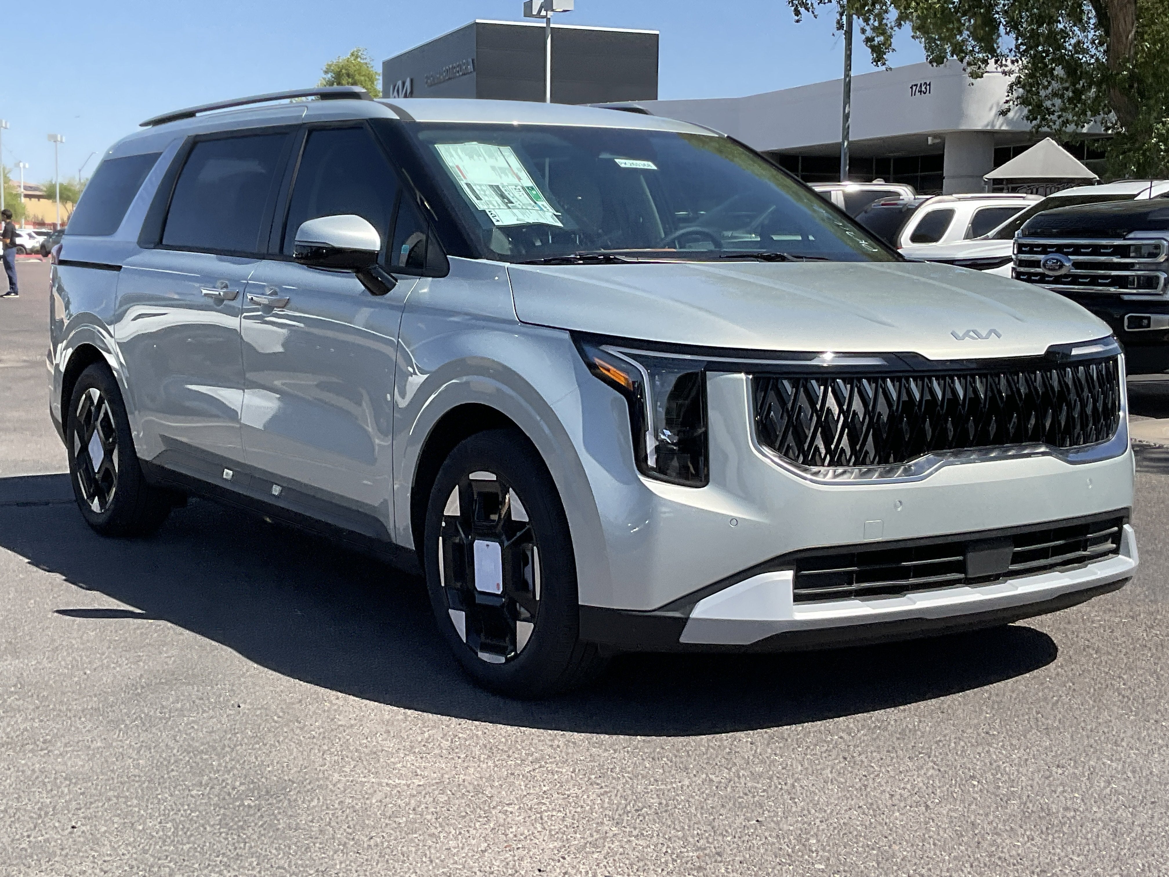 2026 Kia Carnival — rear three-quarter view